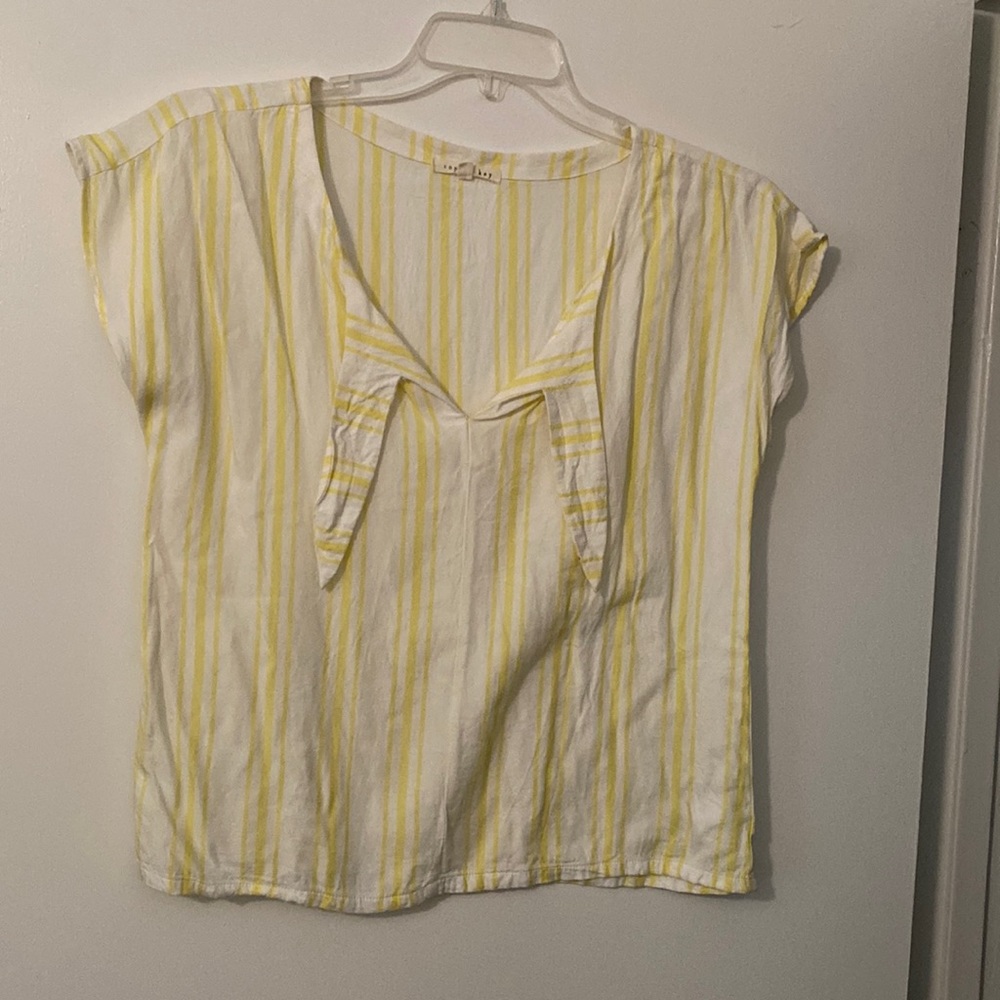 Yellow and white striped blouse